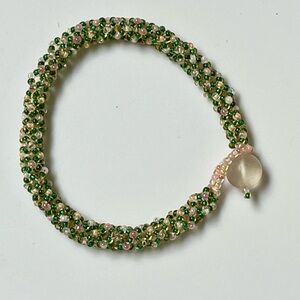 Beaded bracelet green and pink